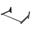 Black wall-mounted pull-up bar on a white wall, with steel frame